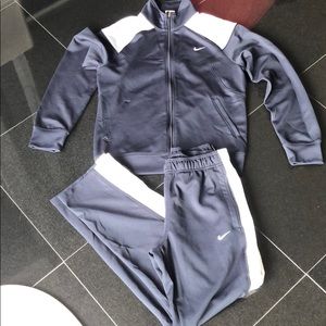 Small Nike tracksuit. Navy blue and white